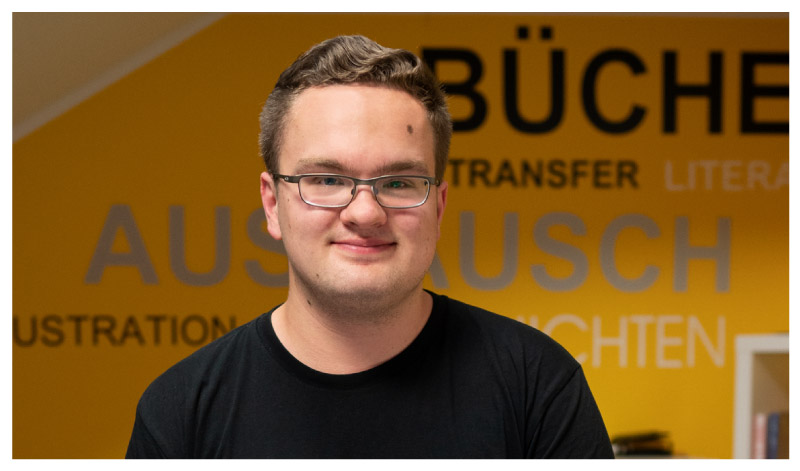 Porträt von Mitarbeiter Tobias